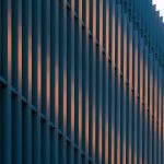 Modern metallic facade, architectural feature with stripped pattern as abstract background