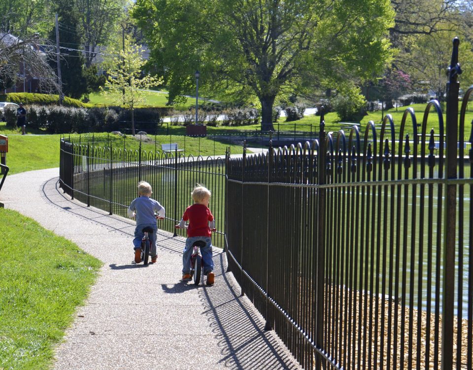 small-boys-children-riding-their-bikes-around-a-du-2026-01-09-00-36-36-utc